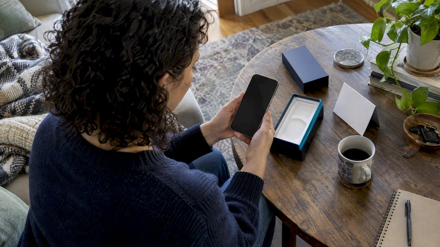 Buyer reviewing refurbished phone warranty